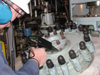 Technician carrying out a Compressed Air Leak Survey Technician carrying out a Compressed Air Leak Survey